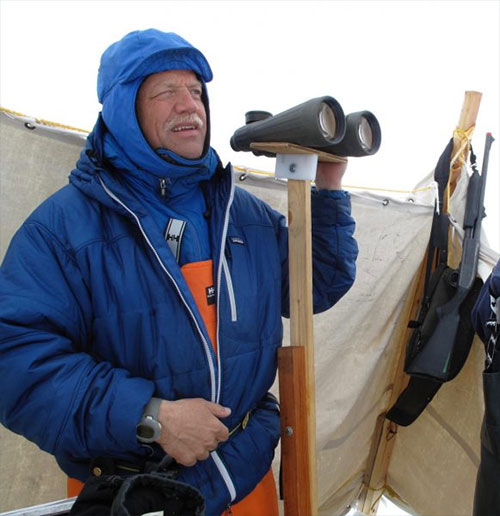 jpg Craig George, a North Slope Borough biologist, looks for migrating bowhead whales north of Utqiagvik in May 2010.