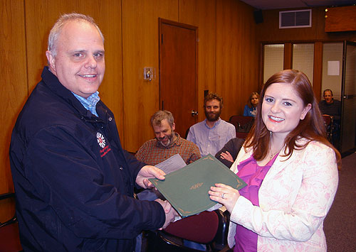 jpg Dr. McKinsee Weyher DDS accepts the Children's Dental Health Month proclamation from City of Ketchikan Mayor Lew Williams. Photograph by Steve Rhyner©  