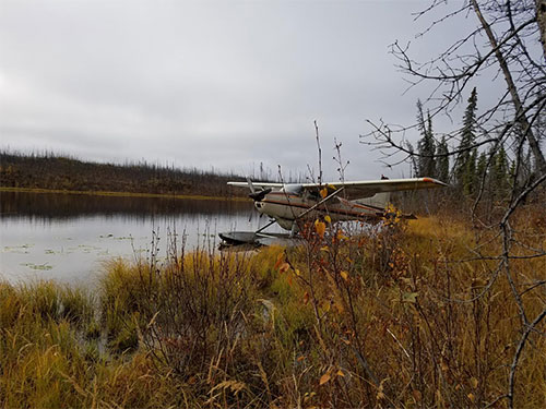 jpg Researchers take a quick break on the shore of one of the lakes sampled in the Yukon Flats National Wildlife Refuge in Alaska.