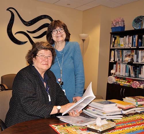 Volunteers multi-task at Cancer Resource Center