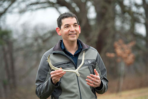 jpg University of Cincinnati assistant professor Joshua Miller holds an antler shed by a female caribou in the Arctic National Wildlife Refuge.