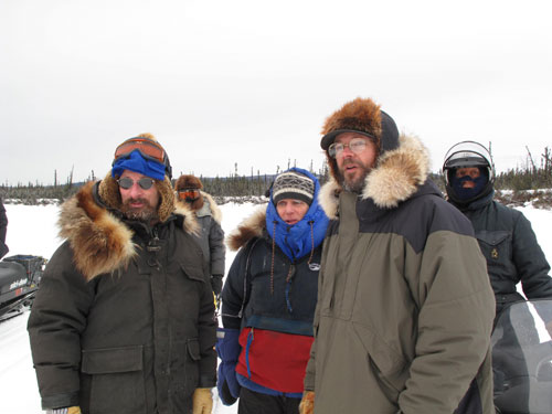 jpg From left, in foreground, Matthew Sturm, Bill Schneider, Knut Kielland, and Sam Demientieff look at possible paths through a slough with unsafe ice. 