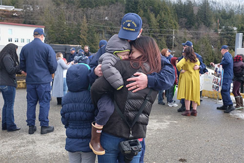 jpg Petty Officer 1st Class Andrew McCormick, a crew member aboard the Coast Guard Cutter John McCormick, greets his family after the Fast Response Cutter and crew arrived at its new homeport in Ketchikan