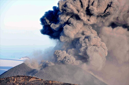 jpg Ash erupts from Veniaminof volcano near Chignik, Alaska, August 18, 2013. Alaska Volcano Observatory / U.S. Geological Survey.