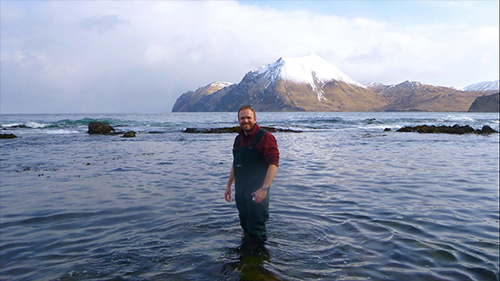 jpg Ian Hewson takes a break from conducting sea star research in the Aleutian Islands, Alaska.