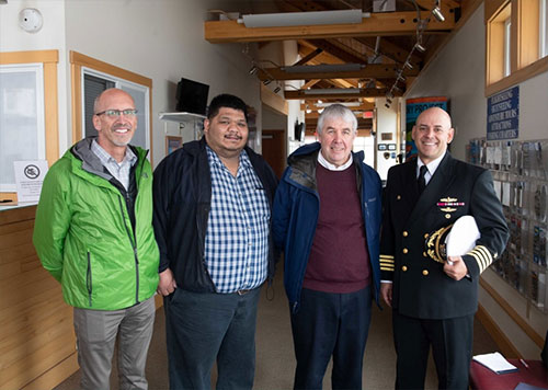 jpg Commanding Officer Capt. Andrew Carlson poses for a photograph with Ketchikan Gateway Borough Mayor David Landis, City of Saxman Mayor Frank Seludo and City of Ketchikan Mayor Robert Sivertsen. 