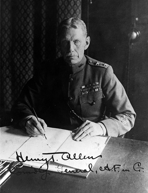 jpg Gen. Henry Allen writes with a fountain pen a few decades after he - as a 26-year-old - crossed Alaska on foot and in boats during a U.S. government-sponsored expedition