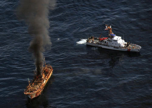 jpg The Japanese fishing vessel Ryou-Un Maru burns after the Coast Guard Cutter Anacapa crew fired explosive ammunition at the vessel 180 miles west of the Southeast Alaskan coast April 5, 2012.