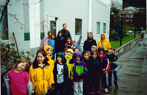 jpg White Cliff teacher Krys (Martin) Jurbelon's class in 1999 pose after planting the "Giving Tree". The small tree, a Dwarf Weeping Cherry tree, is pictured behind the class, left of the door.