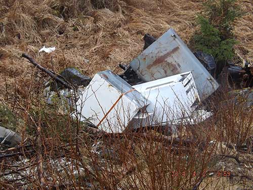 jpg A fuel tank and appliances dumped by the dog park in 2014 a month after the area had been cleaned by the Coast Guard