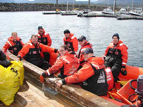 jpg The crew from the Naushon picking trash from Ketchikan breakwaters