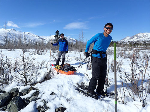 jpg From left, graduate students Yadong Wang (University of Utah) and Kyle Smith (UAF), haul gear for installing temporary seismometers on the Denali Fault south of Delta Junction.