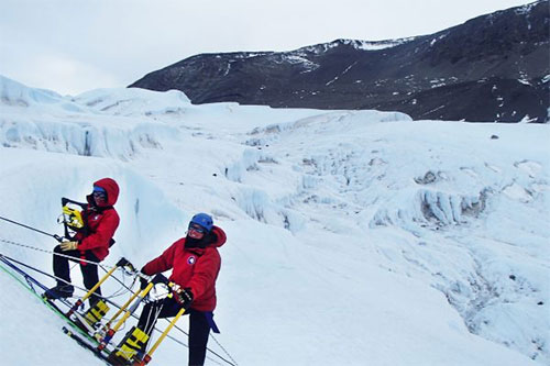 jpg Christina Carr, left, and Jessica Badgeley collect radar data to map the pathway of salty water that connects Blood Falls to the source of water underneath the glacier.