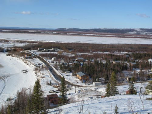 jpg Spring temperatures begin to thaw the main road in Shageluk, the only village remaining on the Innoko River.