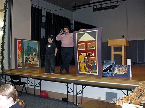 jpg  youth supporter, Miguel Torres and his son conduct the live auction