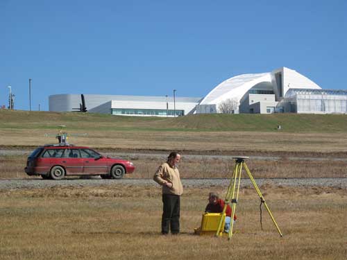 jpg Geophysical Institute researchers Chris Larsen, left, and Austin Johnson, set up a stationary GPS station 