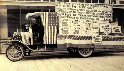 jpg Carl Cordell with a decorated truck in the Fourth of July Parade, 1917, shows the more serious side of the community's wish for a ferry system.