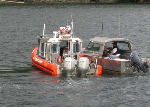 jpg Coast guard rescuers assist stranded boaters