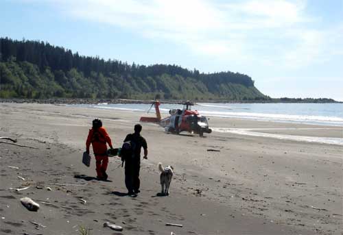 jpg man and dog on beach