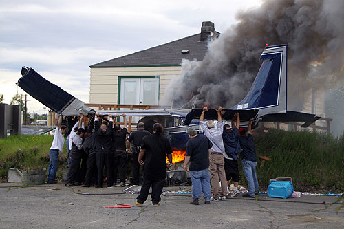 jpg Capt. Erik Boltman and Staff Sgt. Jacob Gibson were on scene when this Cessna 206 crashed into a Fairview home near Elmendorf Air Force Base, Alaska,