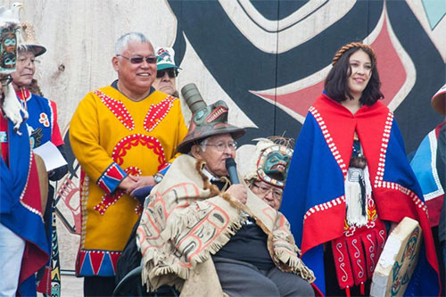 jpg Honored speakers from each clan shared the significance of their crests on the poles. Reverence for ancestors and for today’s youth were recurring messages heard throughout the day. 