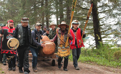 jpg Eagle Pole is carried to the Tribal House