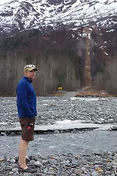 jpg Ned Rozell pauses on the path of the trans-Alaska pipeline near Valdez in 2017.