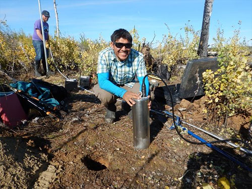 jpg University of Alaska Fairbanks doctoral student Kyle Smith installs a T120 posthole seismometer at a site in the Minto Flats of central Alaska in September, 2015.
Photo by Carl Tape 