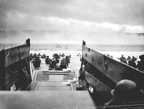jpg Allied troops wade ashore from a Coast Guard landing craft at Omaha Beach, France, on June 6, 1944.