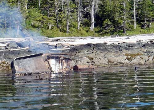 jpg The burned out hull of the 58-foot fishing vessel Legend