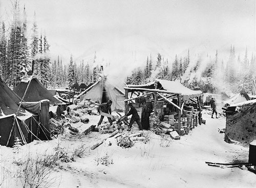 jpg One of the first camps along the Alcan Highway route to be set up in the northern regions of Alaska. A sawmill supplied building materials and wood for fires