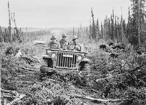 jpg First truck to go over the rough cordurouy road along the Alcan Highway route was an Army jeep