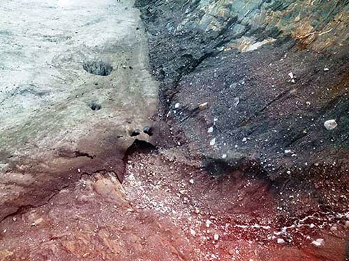 jpg July 16, 2014 photo shows new holes opening in the ice cave entry
Photographer John Neary USFS