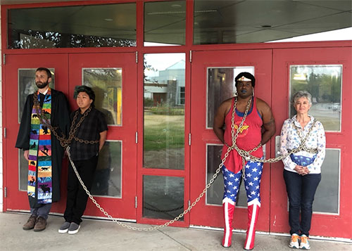jpg Wasilla protesters chained in front of door to Wasilla Middle School