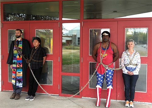 jpg Wasilla protesters chained in front of door to Wasilla Middle School 