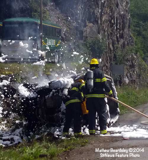 jpg After the Explorer flames are extinguished 
by the Ketchikan Fire Department using foam.