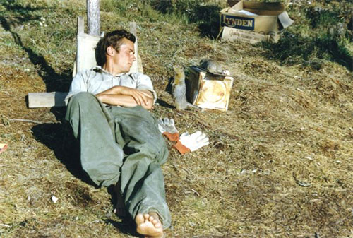 jpg George Schaller and a squirrel face off in a camp along the Sheenjek River in 1956.