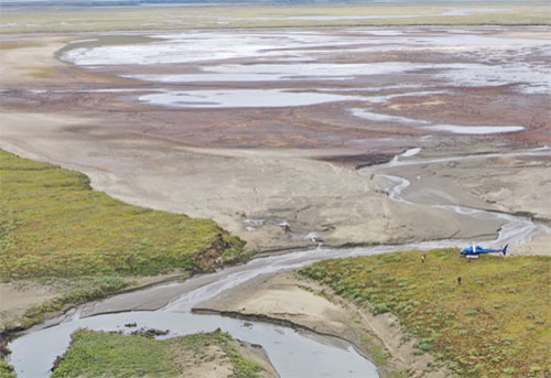 jpg Harry Potter Lake, pictured in this drone photo, lies mostly empty after its water drained into a nearby creek on Alaska’s North Slope in early July 2022.