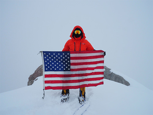 jpg apt. Stephen Austria, project engineer in the USACE-Alaska District's Foreign Military Sales Program, carried this American flag on his expedition climbing Denali this past summer. 