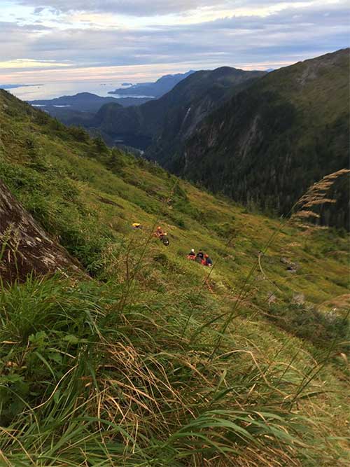 jpg The injured hiker with a badly broken leg was located on a small ledge, in steep terrain at the base of a 150 foot cliff.