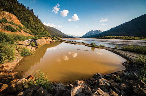 jpg Runoff from the Tulsequah Chief mine, southwest of Atlin, B.C. flows into the Tulsequah River, about 6.2 miles upstream from its confluence with the Taku River, which flows into Southeast Alaska.