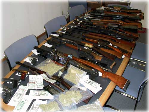 jpg drugs, cash and guns confiscated