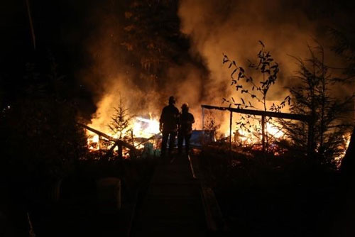 jpg A close up of the structure fire in the Rosa Reef area on Gravina Island as photograph by fire crew of the M/V Harry Newell.