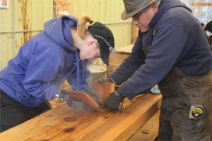 jpg Adzer Tammi Meissner and master carver Wayne Price work the second bend in her bentwood box