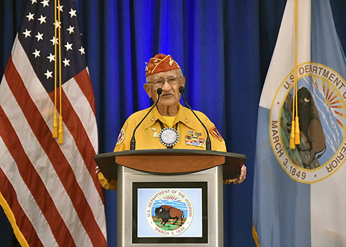 jpg Navajo Code Talker Thomas Begay speaks at an event at the Main Interior Building in 2016. 