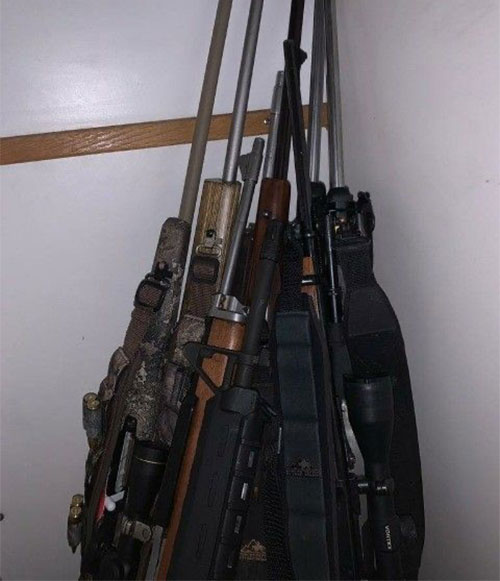 jpg Hunting rifles seized by law enforcement during the operation.