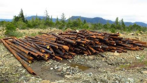 jpg Removed pipeline sits in a pile waiting to be removed from Annette Island as part of cleanup effort accomplished by the Metlakatla Indian Community under the Native American Lands Environmental Mitigation Program.