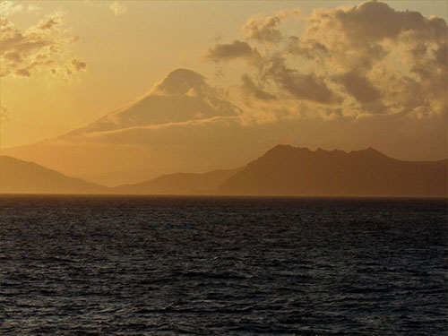 jpg Mt. Shishaldin on Unimak Island is one of numerous active volcanoes of the Aleutian Arc. 