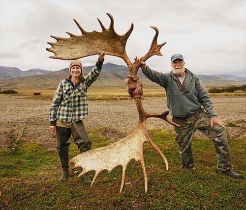 jpg Tia Shoemaker and her dad with a giant moose rack on the Alaska Peninsula.