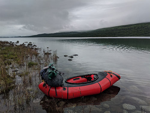 jpg Glen's Alpacka packraft in the Bay of Islands on the Savonoski Loop.